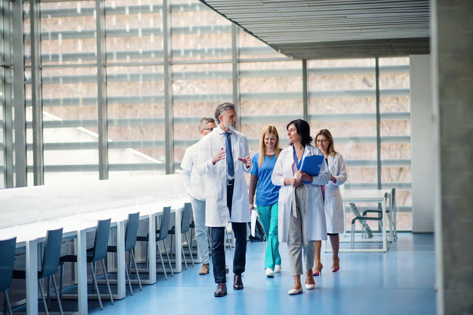 Medical team walking through a hospital corridor
