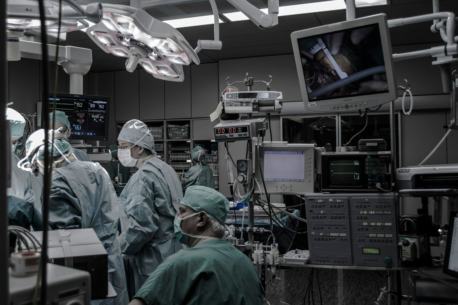 Illustrative surgical team in an operating theatre